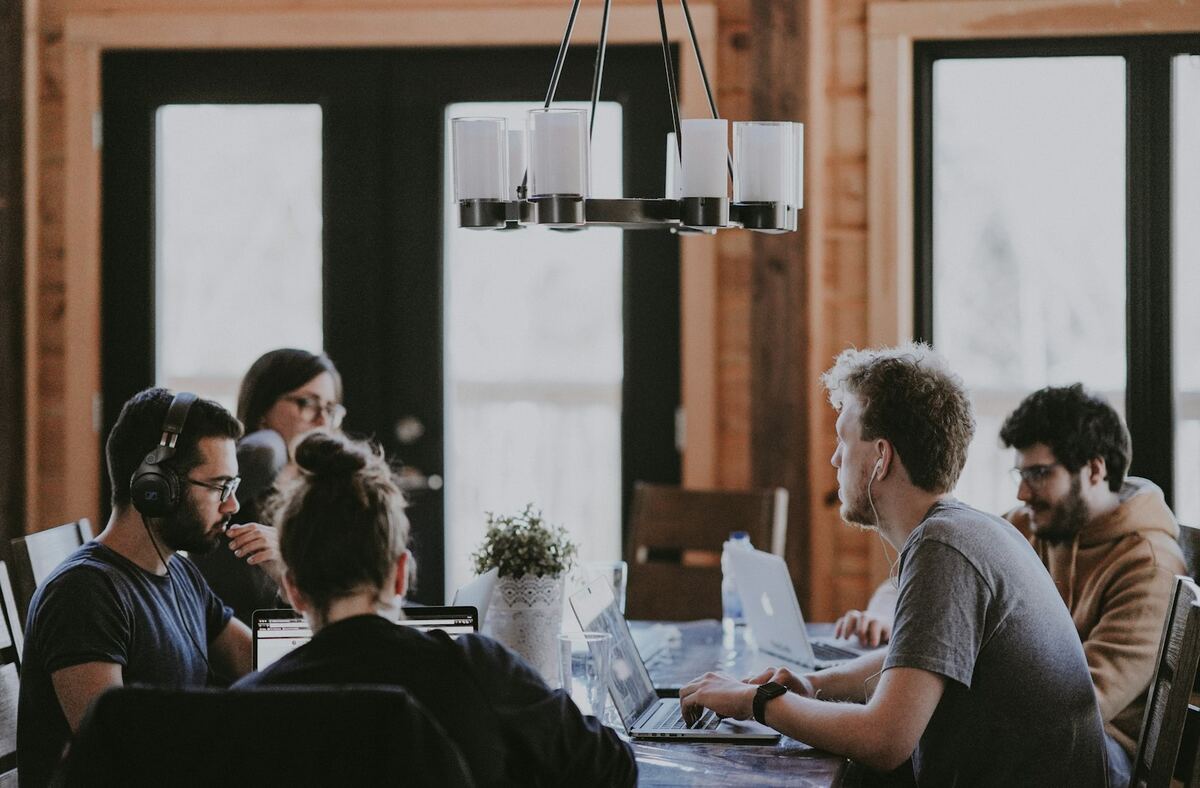 Veltell team collaborating in a modern office